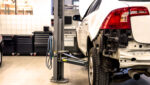 white honda civic on lift web